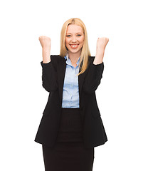 Image showing happy woman with hands up