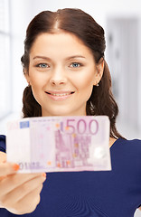 Image showing lovely woman with euro cash money