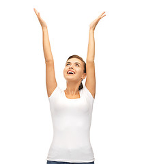 Image showing happy woman with hands up