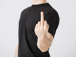 Image showing man showing middle finger