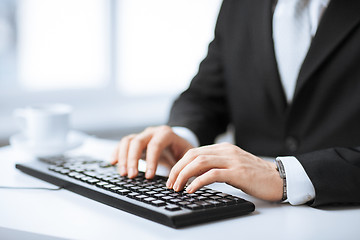 Image showing man hands typing on keyboard