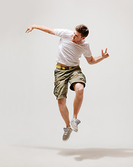 Image showing male dancer jumping in the air