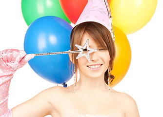 Image showing happy girl with colorful balloons