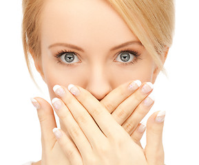 Image showing amazed woman with hand over mouth