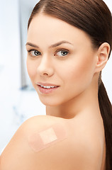 Image showing beautiful woman with medical patch or plaster