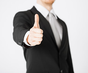 Image showing man showing thumbs up