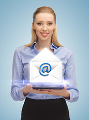Image showing woman showing virtual envelope
