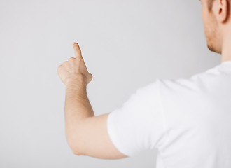 Image showing man hand pointing at something