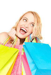 Image showing excited woman with shopping bags