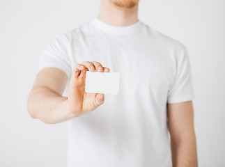 Image showing man hand with blank paper