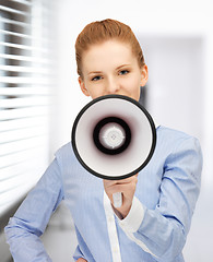 Image showing happy woman with megaphone