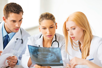 Image showing young group of doctors looking at x-ray