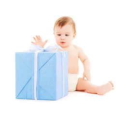 Image showing happy child with gift box