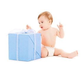 Image showing happy child with gift box