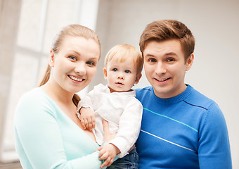 Image showing happy family with adorable baby