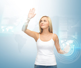 Image showing woman working with virtual screen