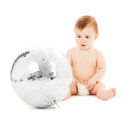 Image showing child playing with disco ball