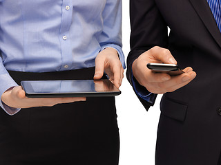 Image showing hands with smartphones and tablet pc