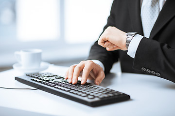 Image showing man hands typing on keyboard