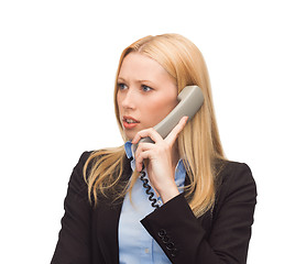 Image showing picture of confused woman with phone