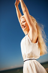 Image showing beautiful woman enjoying summer outdoors