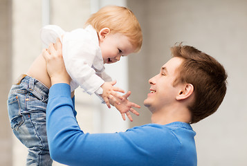 Image showing happy father with adorable baby