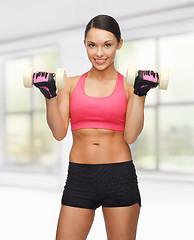 Image showing woman with dumbbells