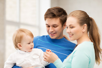Image showing happy family with adorable baby