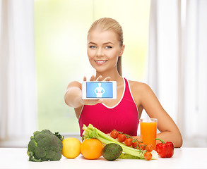 Image showing woman with fruits, vegetables and smartphone