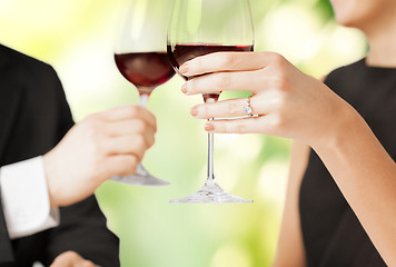 Image showing engaged couple with wine glasses