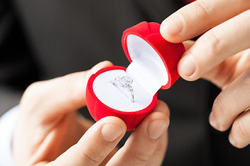 Image showing man with wedding ring and gift box