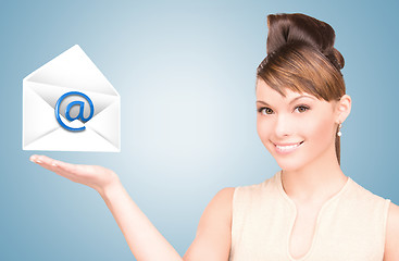 Image showing woman showing virtual envelope