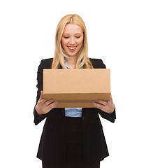 Image showing businesswoman delivering cardboard box