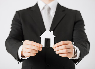 Image showing man hands holding paper house