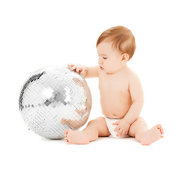 Image showing child playing with disco ball