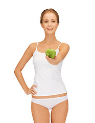 Image showing woman in white underwear holding green apple