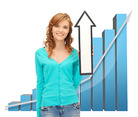 Image showing girl with big 3d chart holding arrow sign