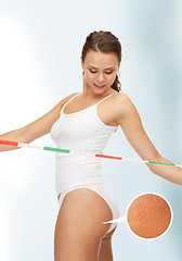 Image showing woman looking at her cellulite