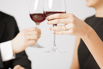 Image showing engaged couple with wine glasses