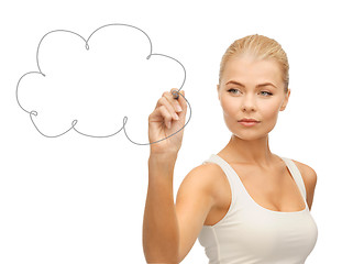 Image showing woman drawing cloud in the air