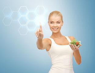 Image showing woman with salad and virtual screen