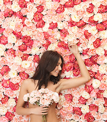 Image showing woman and background full of roses