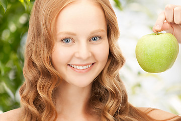 Image showing young beautiful woman with green apple