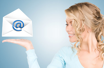 Image showing woman showing virtual envelope