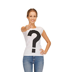 Image showing woman in white t-shirt pointing at you