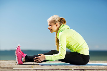 Image showing woman doing sports outdoors