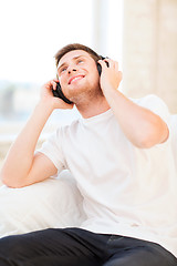 Image showing man with headphones listening to music