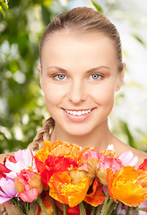 Image showing lovely woman with red flowers