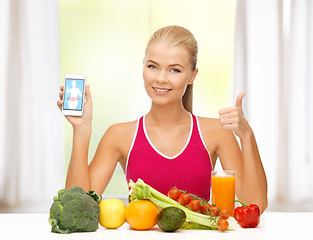 Image showing woman with fruits, vegetables and smartphone