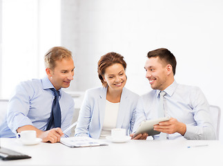 Image showing business team having fun with tablet pc in office